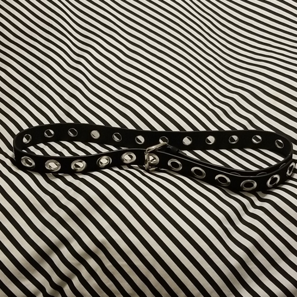 Torrid black suede grommet belt
